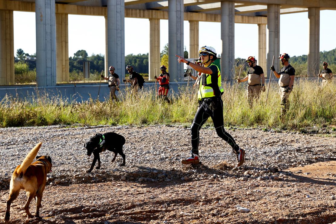 Members of a search and rescue team search for bodies after flooding in Chiva, Spain, on November 2.